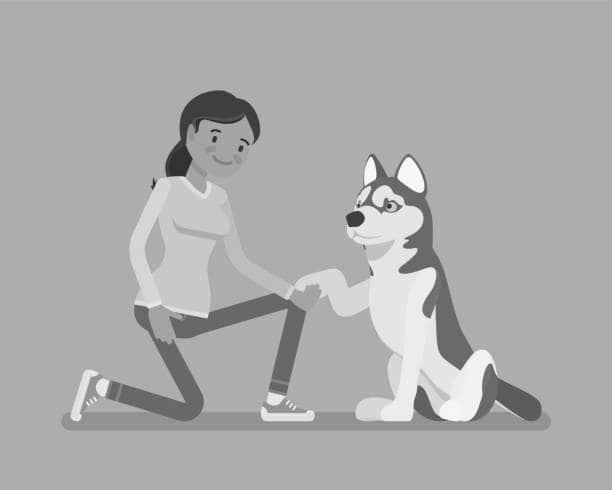 Black and white cartoon illustration of a woman kneeling down to pet a dog and holding its paw.