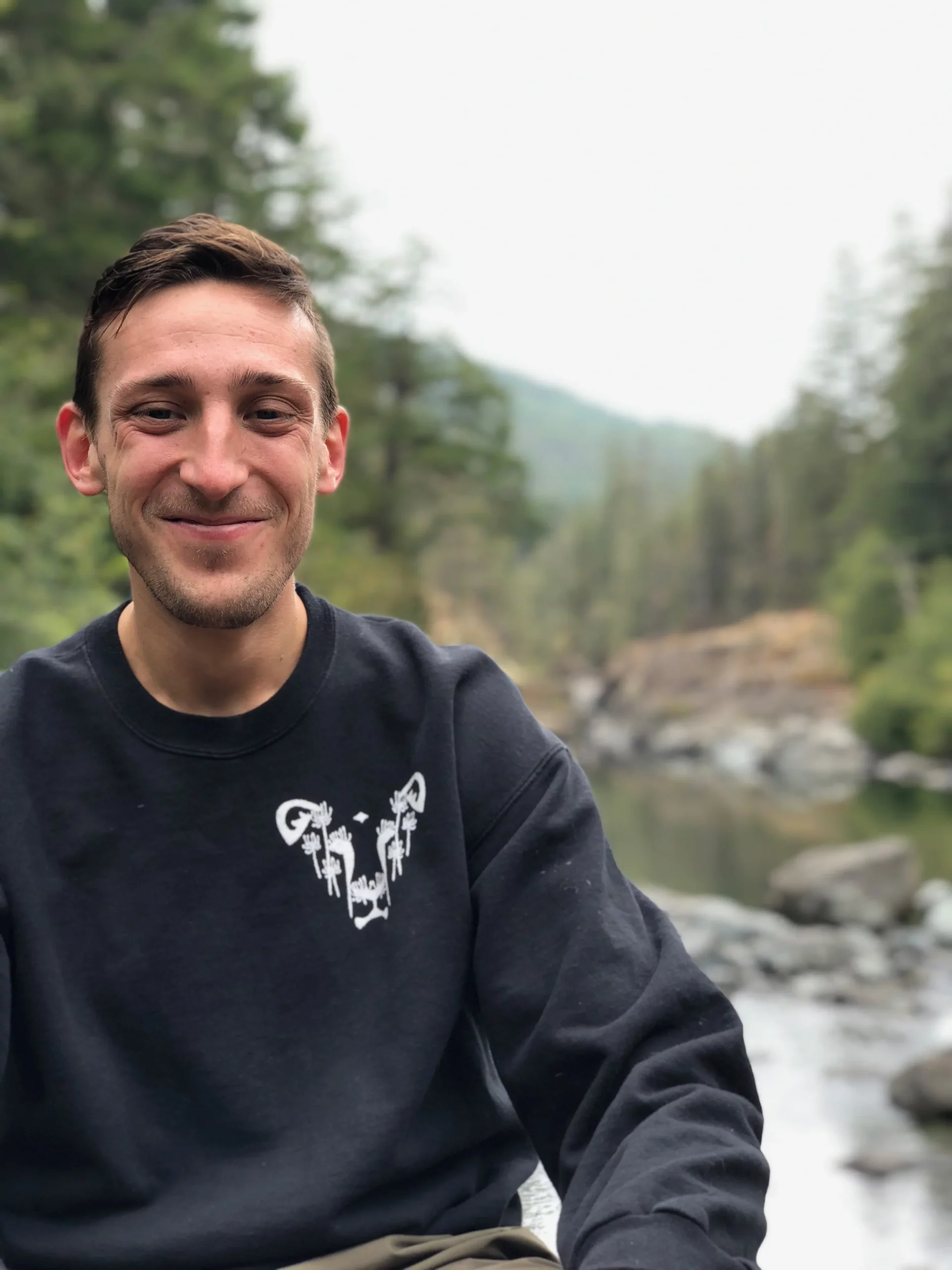 dandi lion dandelion the honest whisper black sweater lion non-profit vegan online shop animal rights british columbia canada casual forest wilderness explore river stream